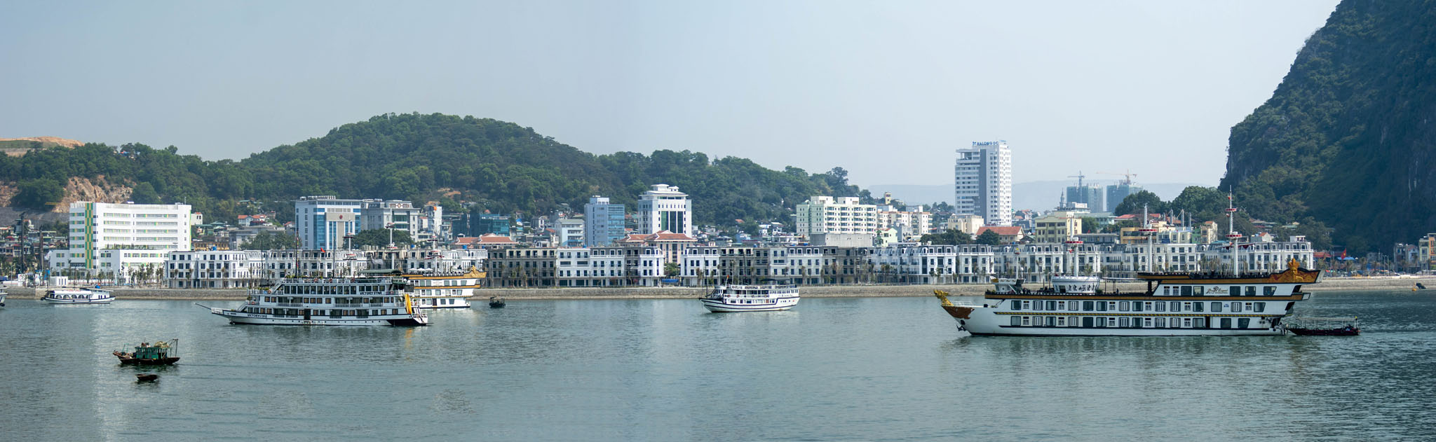 Halong Bay, View of the township; Sailing by