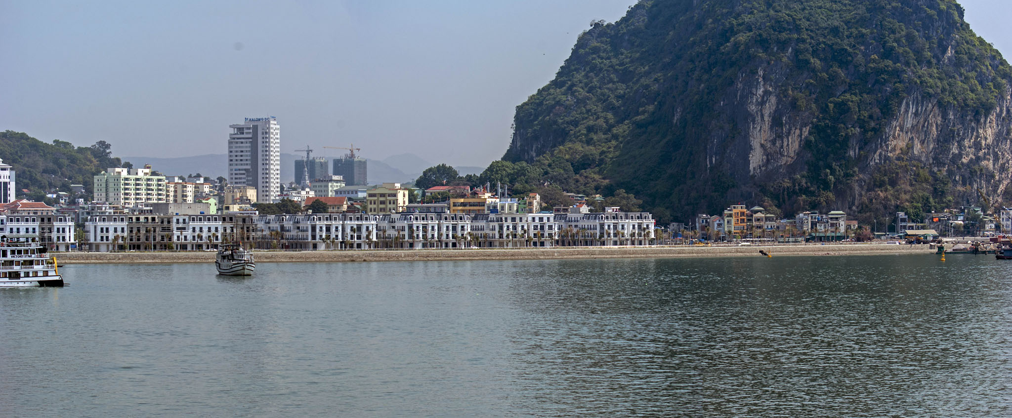 Halong Bay, View of the township; Sailing by